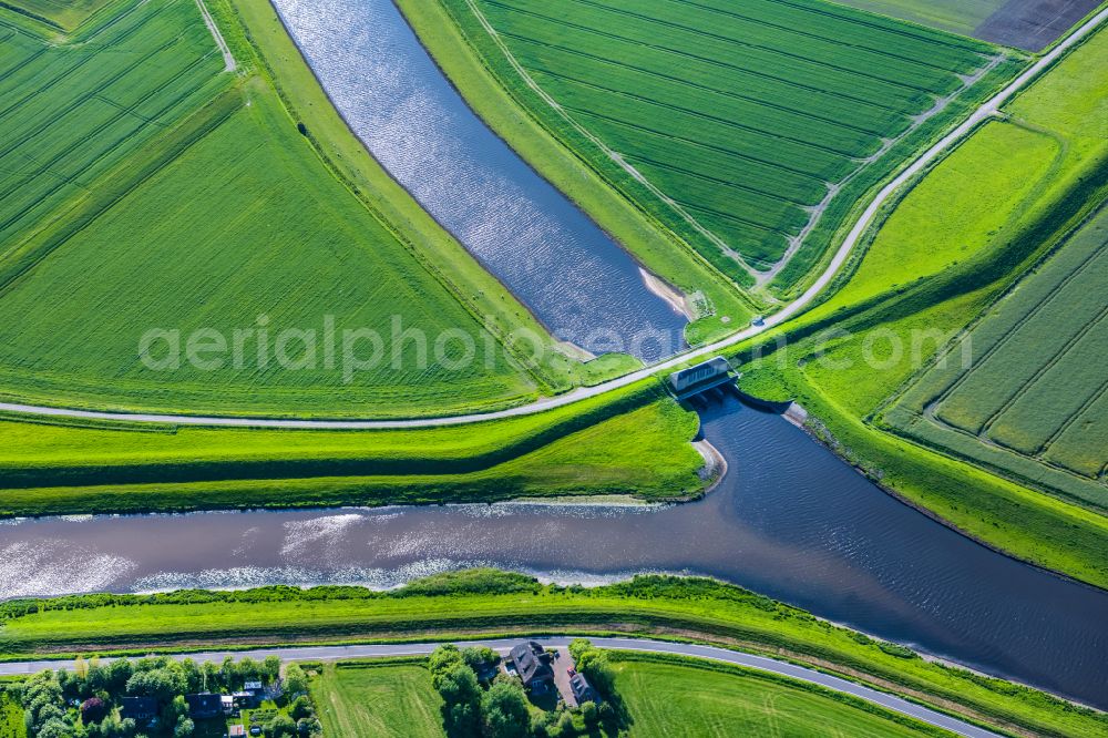 Aerial image Ockholm - Canal course and shore areas of the connecting canal Bongsieler Kanal in Ockholm North Friesland in the state Schleswig-Holstein, Germany