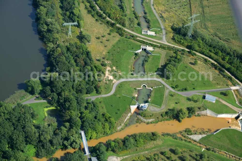 Böhlen from above - Channel and riparian areas of a canal connecting Lake Hainer See and the river Pleisse in Boehlen in the state of Saxony