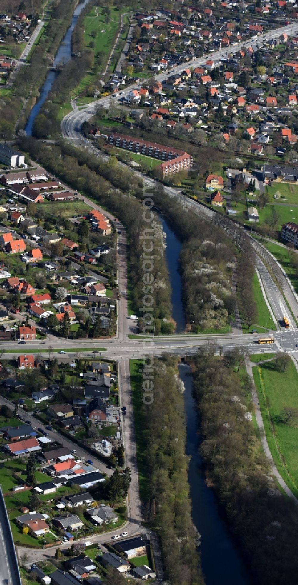 Rodovre from above - Channel flow and river banks of the waterway shipping Faestningskanalen in Rodovre in Copenhagen, Denmark