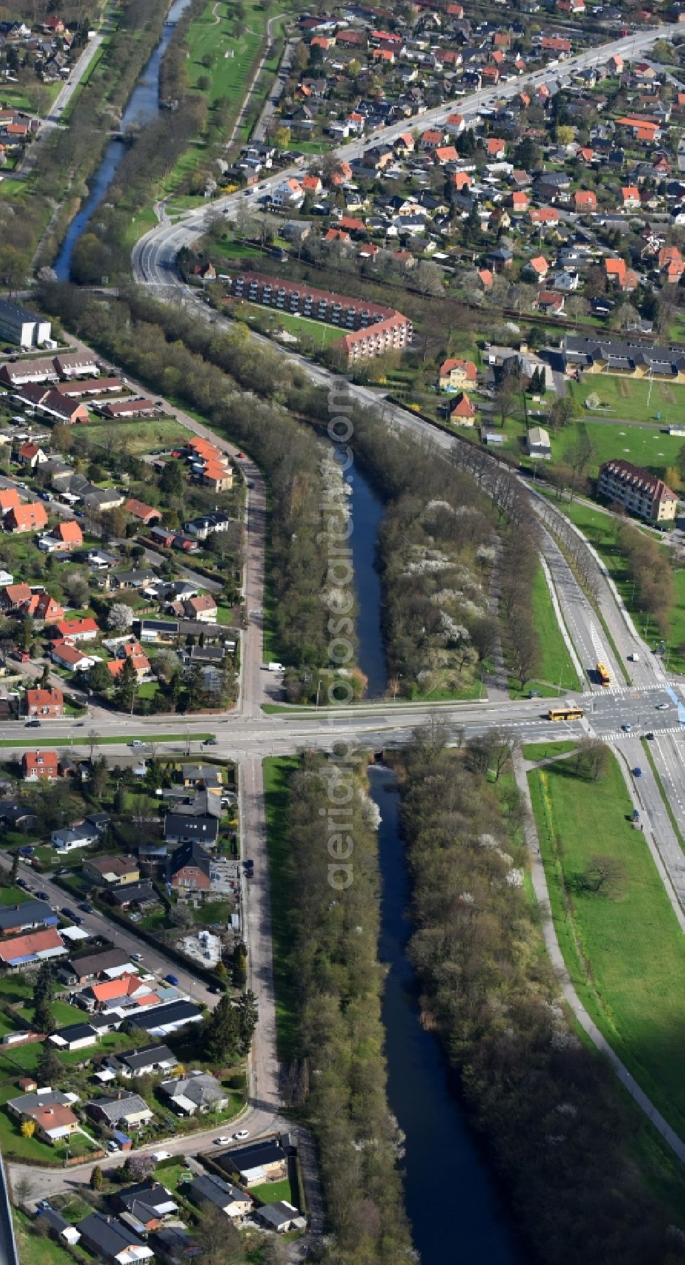 Rodovre from the bird's eye view: Channel flow and river banks of the waterway shipping Faestningskanalen in Rodovre in Copenhagen, Denmark