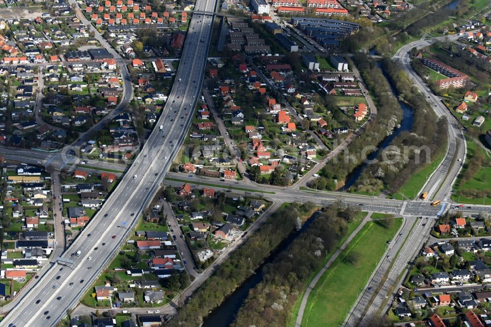 Aerial image Rodovre - Channel flow and river banks of the waterway shipping Faestningskanalen in Rodovre in Copenhagen, Denmark