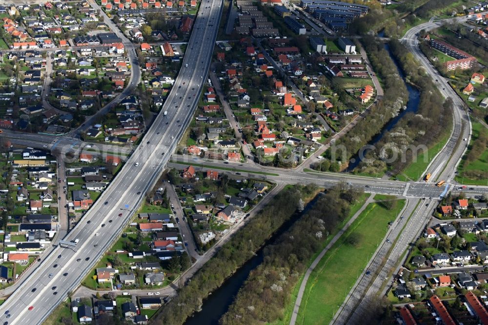 Aerial photograph Rodovre - Channel flow and river banks of the waterway shipping Faestningskanalen in Rodovre in Copenhagen, Denmark