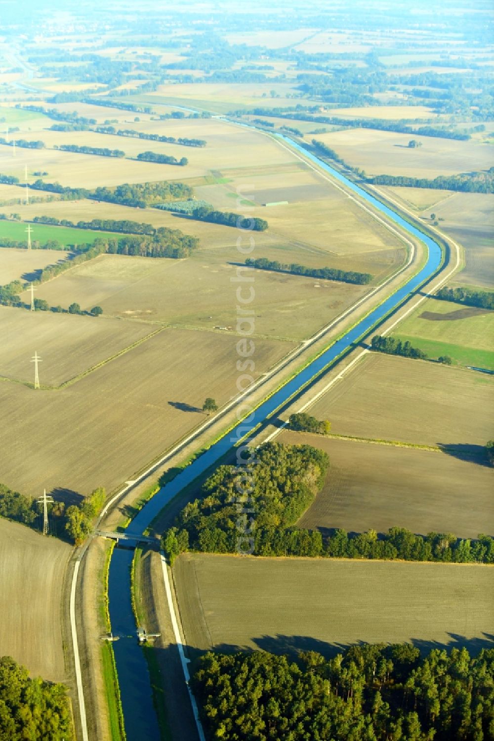 Aerial image Lüchow - Channel flow and river banks of the waterway shipping Jeetzel in Luechow in the state Lower Saxony, Germany