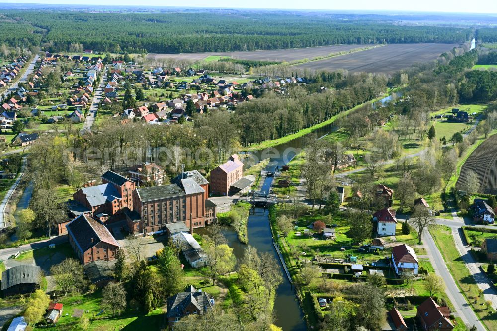 Neu Kaliß from above - Channel flow and river banks of the waterway shipping MEW Mueritz-Elde-Wasserstrasse in Neu Kaliss in the state Mecklenburg - Western Pomerania, Germany