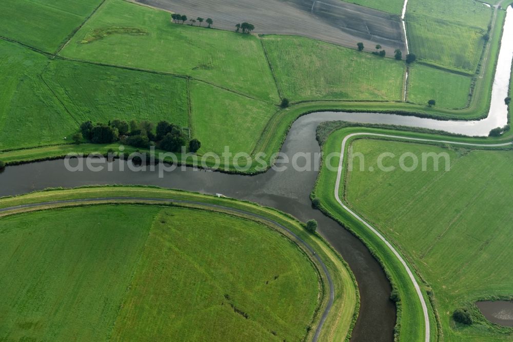 Aerial photograph Detern - Channel flow and river banks of the waterway shipping Nordloher-Barsseler Tief on corner to Dreyschloot- canal in Detern in the state Lower Saxony