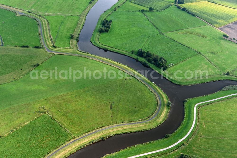 Detern from above - Channel flow and river banks of the waterway shipping Nordloher-Barsseler Tief on corner to Dreyschloot- canal in Detern in the state Lower Saxony