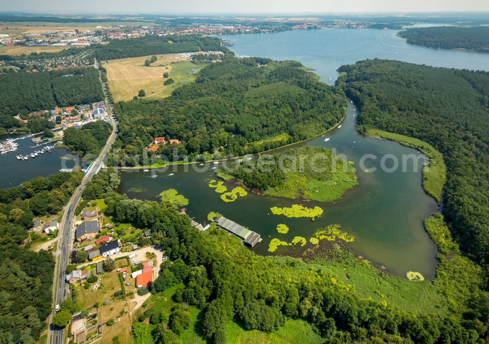 Waren (Müritz) from the bird's eye view: Channel flow and river banks of the waterway shipping Reeckkanal in Waren (Mueritz) in the state Mecklenburg - Western Pomerania