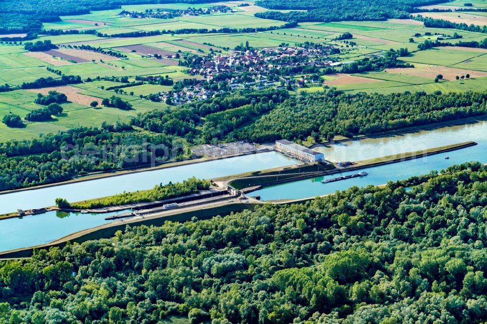 Rhinau from above - Channel flow and river banks of the waterway shipping Rhine in Rhinau in Grand Est, France