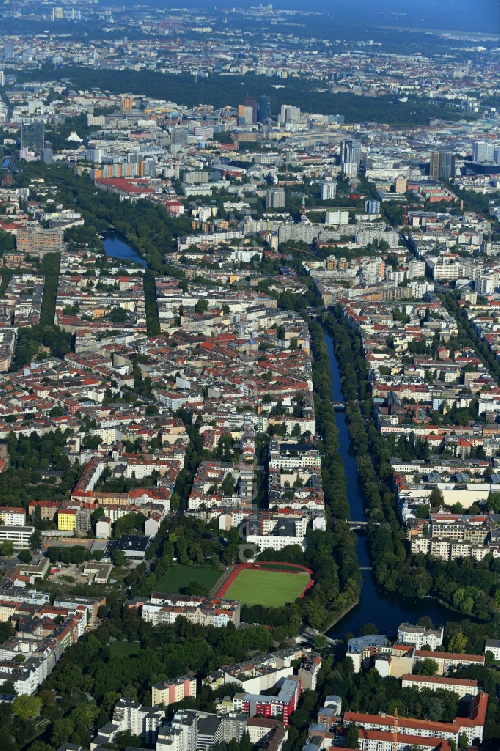 Aerial image Berlin - Channel flow and river banks of the waterway shipping Landwehrkanal in the district Kreuzberg in Berlin, Germany