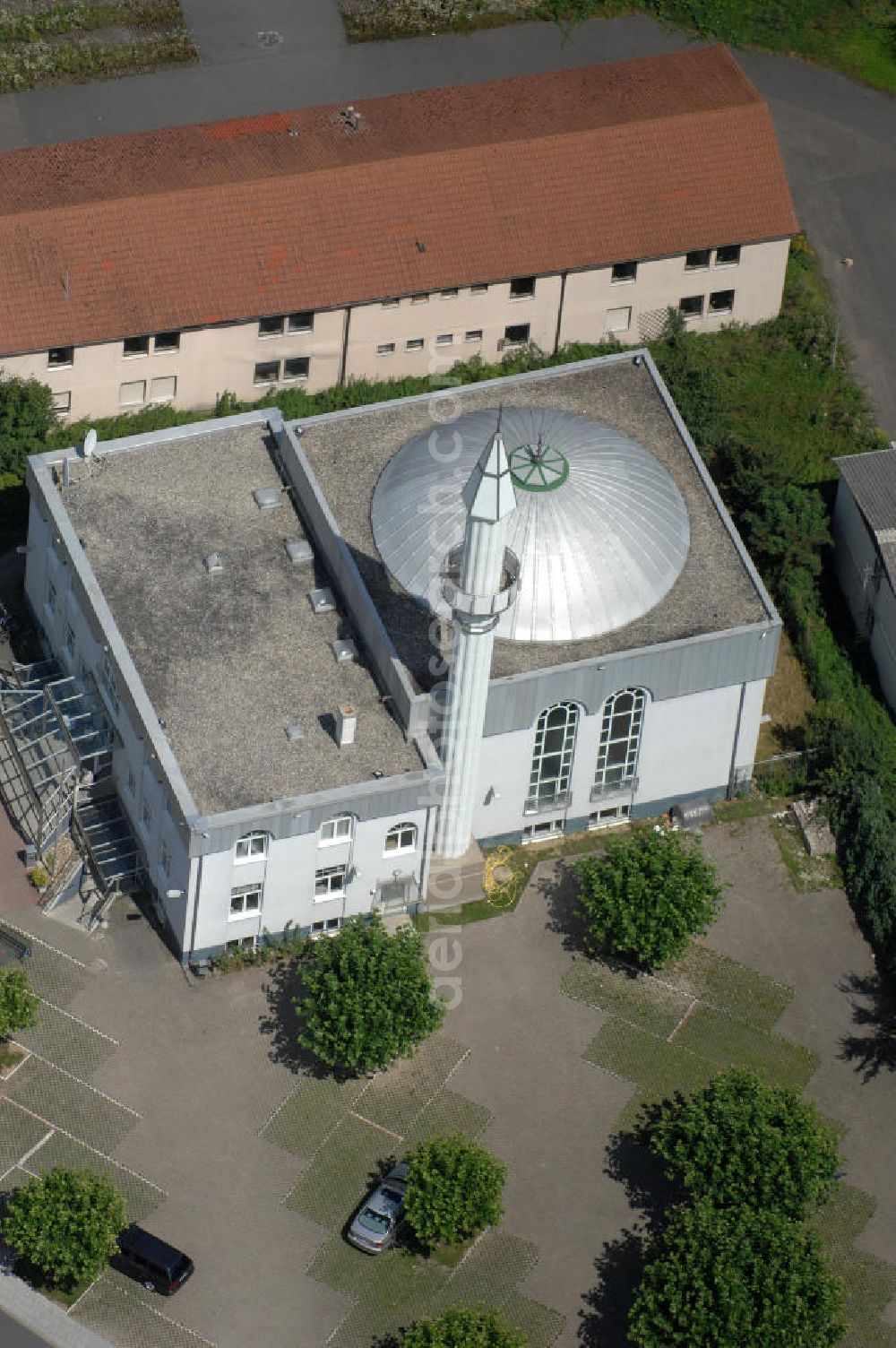 Wiesloch from the bird's eye view: Blick auf die Kanuni Sultan Süleyman Camii. Die Moschee wurde 1995 eröffnet, der Gottesdienst findet in türkischer Sprache statt. Sie gehört dem Dachveband Türkisch-Islamische Union (DITIB) an. Kontakt: Kanuni Sultan Süleyman Camii in Wiesloch, In den Auwiesen 1, 69168 Wiesloch, Tel. 06222 / 8712