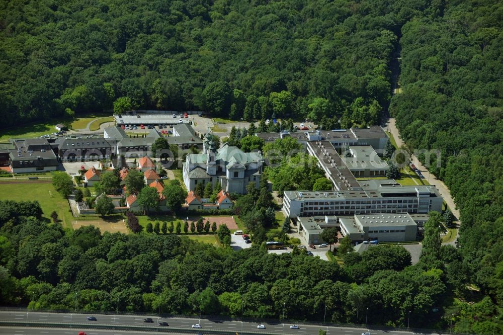 Warschau from the bird's eye view: Cardinal Stefan Wyszynski University with the Church Parafia Bl E. Detkenska on Dewajtisin in Warsaw Masovian Voivodeship in Poland