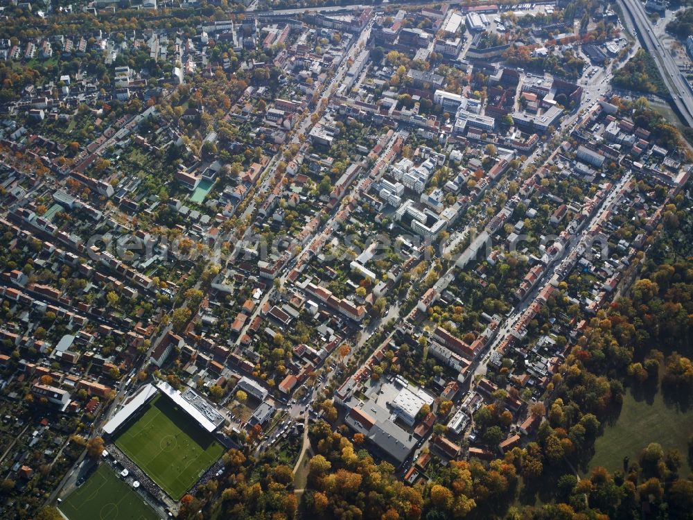 Potsdam Babelsberg from the bird's eye view: The Karl Liebknecht Stadium in Babelsberg North in the state capital of Potsdam in the state of Brandenburg. The football arena with its adjacent training facilities is home to two football teams. The squad of SV Babelsberg 03 is playing in the regional leaque North East. The 1. FFC Turbine Potsdam is one of Europe's most successful women's football teams. In the background are residential areas of Babelsberg