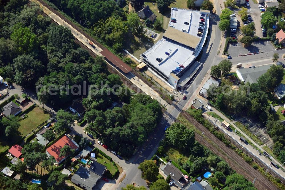 Blankenfelde from above - Road layout of the Karl-Marx-Straße on the railway line Dresdner Bahn to the station Blankenfelde in Brandenburg. By the engineering community Dresdner Bahn is the new construction of a railway bridge as planned bridge construction