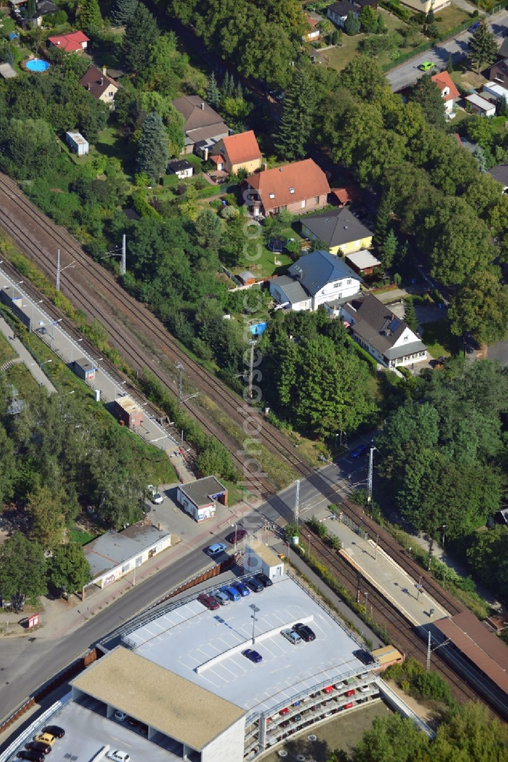 Blankenfelde from above - Road layout of the Karl-Marx-Straße on the railway line Dresdner Bahn to the station Blankenfelde in Brandenburg. By the engineering community Dresdner Bahn is the new construction of a railway bridge as planned bridge construction