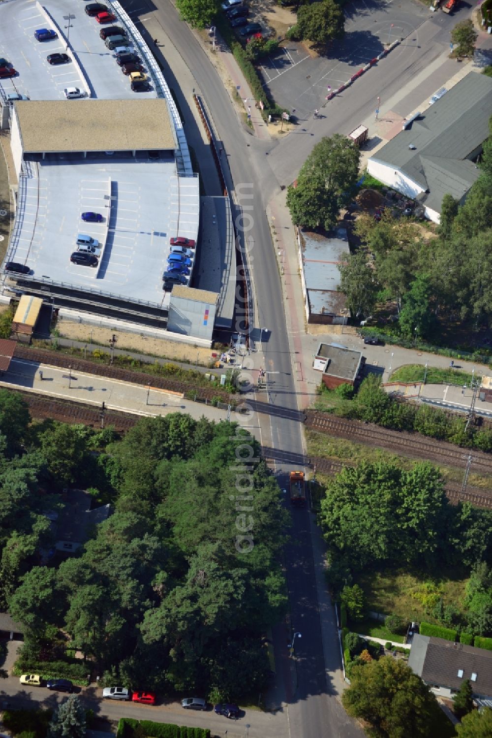 Aerial image Blankenfelde - Road layout of the Karl-Marx-Straße on the railway line Dresdner Bahn to the station Blankenfelde in Brandenburg. By the engineering community Dresdner Bahn is the new construction of a railway bridge as planned bridge construction