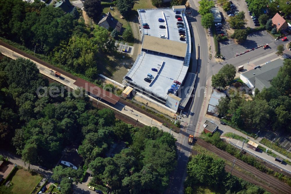 Aerial photograph Blankenfelde - Road layout of the Karl-Marx-Straße on the railway line Dresdner Bahn to the station Blankenfelde in Brandenburg. By the engineering community Dresdner Bahn is the new construction of a railway bridge as planned bridge construction