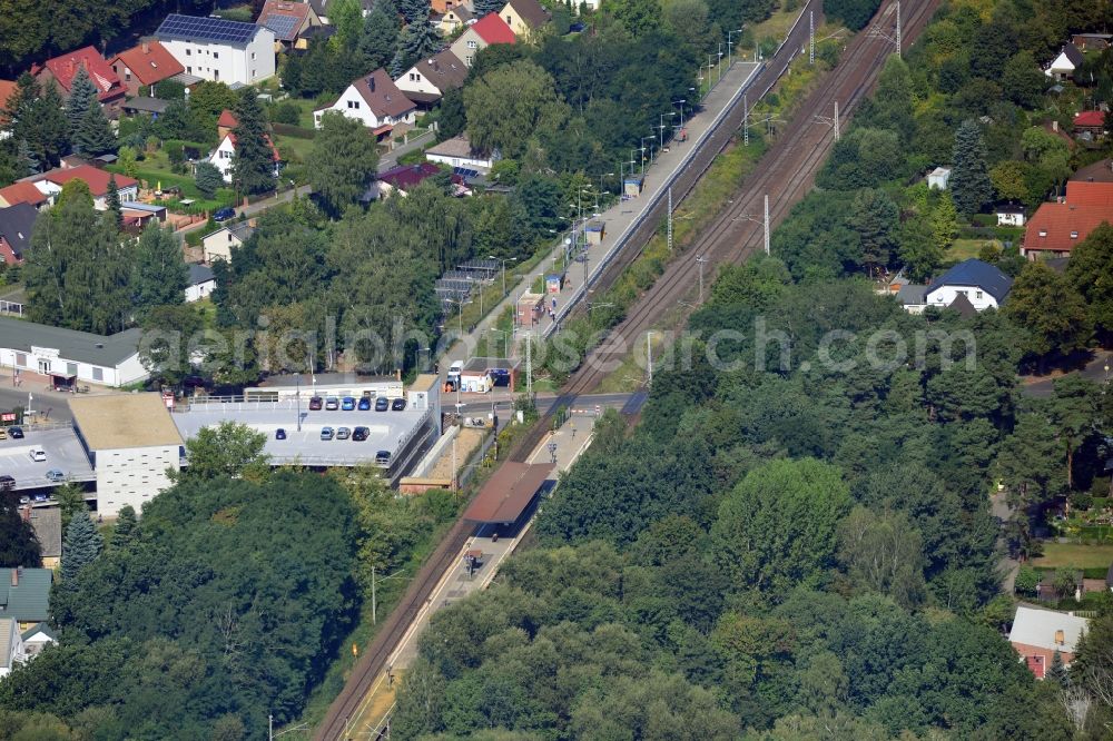 Blankenfelde from above - Road layout of the Karl-Marx-Straße on the railway line Dresdner Bahn to the station Blankenfelde in Brandenburg. By the engineering community Dresdner Bahn is the new construction of a railway bridge as planned bridge construction