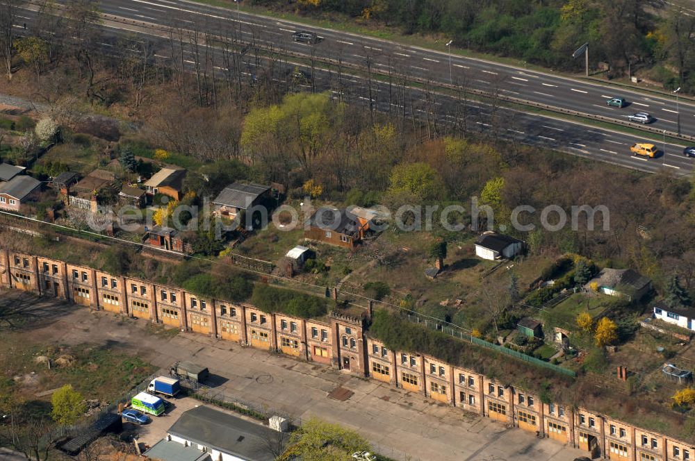 Aerial image Magdeburg - Blick auf die Kasematten an der Maybachstraße, der Westwall. Eine Kasematte ist ein vor Artilleriebeschuss geschütztes unterirdisches Gewölbe im Festungsbau. Auf den Kasematten befindet sich eine Kleingartenanlge und im Hintergrund die Schnellstraße / Tangente welche quer durch Magdeburg führt.