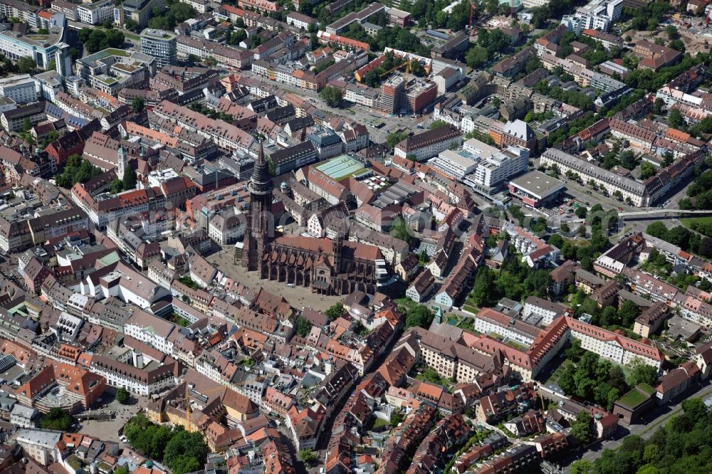 Freiburg im Breisgau from above - Church building of the cathedral of Freiburger Muenster on Muensterplatz in Freiburg im Breisgau in the state Baden-Wuerttemberg