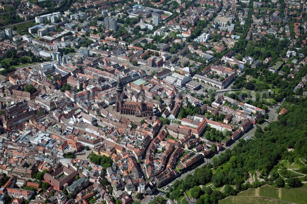 Aerial image Freiburg im Breisgau - Church building of the cathedral of Freiburger Muenster on Muensterplatz in Freiburg im Breisgau in the state Baden-Wuerttemberg