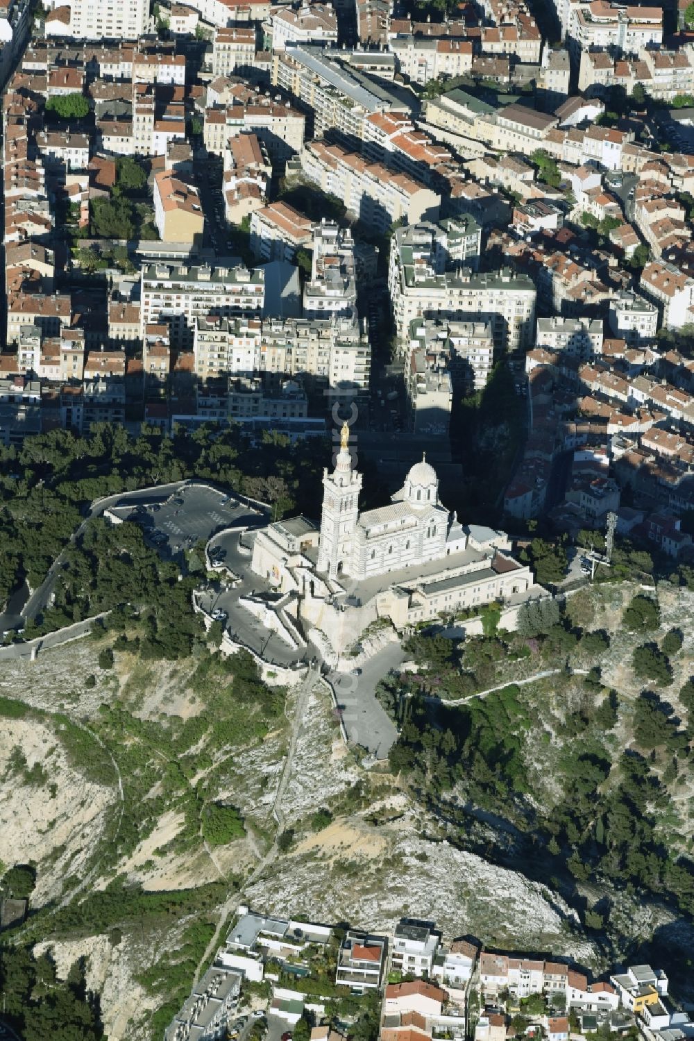 Marseille from above - Church building of the cathedral of Notre-Dame-de-la-Garde on Rue Fort du Sanctuaire in Marseille in Provence-Alpes-Cote d'Azur, France