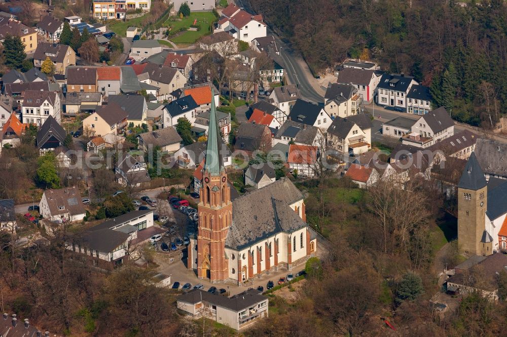 Aerial photograph Fröndenberg/Ruhr - View of the catholic parish church St. Marien in Fröndenberg in the state North Rhine-Westphalia. The heritage-protected church was erected by Franz Langenberg as a hall church. After suffering heavy damage during World War II, the building was renovated as a pilaster church