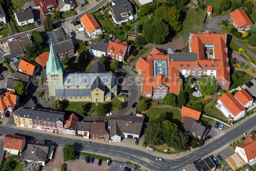 Aerial photograph Hamm - View of the catholic parish church in Hamm in the state North Rhine-Westphalia. This church is a heritage-protected building in the district Rhynern of Hamm