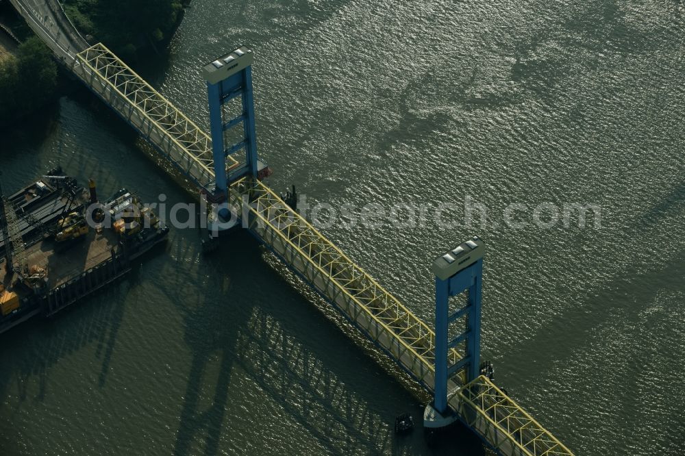 Aerial image Hamburg - Bridge Kattwykbruecke across the Sued- Elbe in Hamburg, Germany. The bridge is located in the port of Hamburg and is being used for rail and road traffic. Kattwykdamm crosses the bridge with its blue tower