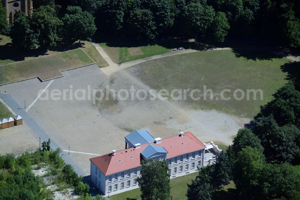 Neustrelitz from the bird's eye view: Kavaliershaus in the Eastern part of the castle park in Neustrelitz in the state of Mecklenburg - Western Pomerania. The historic building is located on the edge of the park