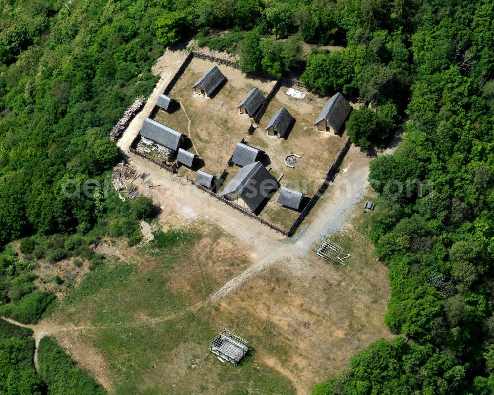 Bundenbach from above - Former celtic settlement of Altburg near Bundenbach in the state of Rhineland-Palatinate. The Altburg settlement and open air museum is located on a wooded hill in the Hunsrueck region above the Hahnenbach creek valley