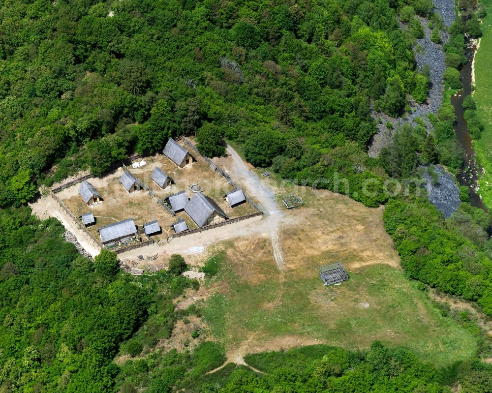 Bundenbach from the bird's eye view: Former celtic settlement of Altburg near Bundenbach in the state of Rhineland-Palatinate. The Altburg settlement and open air museum is located on a wooded hill in the Hunsrueck region above the Hahnenbach creek valley