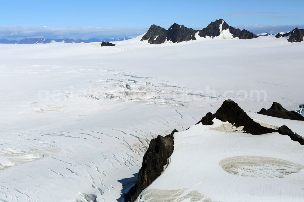 Aerial image Kenai Fjords National Park - Harding Icefield in the Kenai Mountains in Kenai Fjords National Park on the Kenai Peninsula in Alaska in the United States of America United States