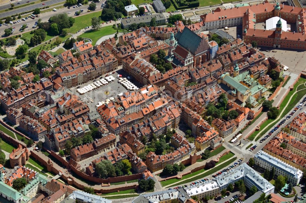 Warschau from above - Center of the historic Warsaw Old Town of Warsaw in Poland. The old town houses and streets on the market square were rebuilt largely true to the original and are a World Heritage Site by UNESCO. In the picture displayed the The Royal Castle in Warsaw