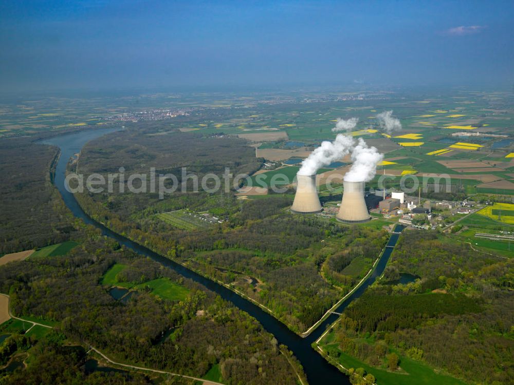 Gundremmingen from above - Aufsteigende Rauchwolken von den Kühltürmen des Kernkraftwerk Gundremmingen. Das KGG ist mit einer Leistung von 2 × 1344 MW das leistungsstärkste deutsche Kernkraftwerk. Es steht in Gundremmingen im schwäbischen Landkreis Günzburg in Bayern. Betreiber ist die Kernkraftwerk Gundremmingen GmbH (KGG). View of the nuclear power plant Gundremmingen (abbreviation KGG) has a capacity of 2 × 1344 MW, the most powerful German nuclear power plant.