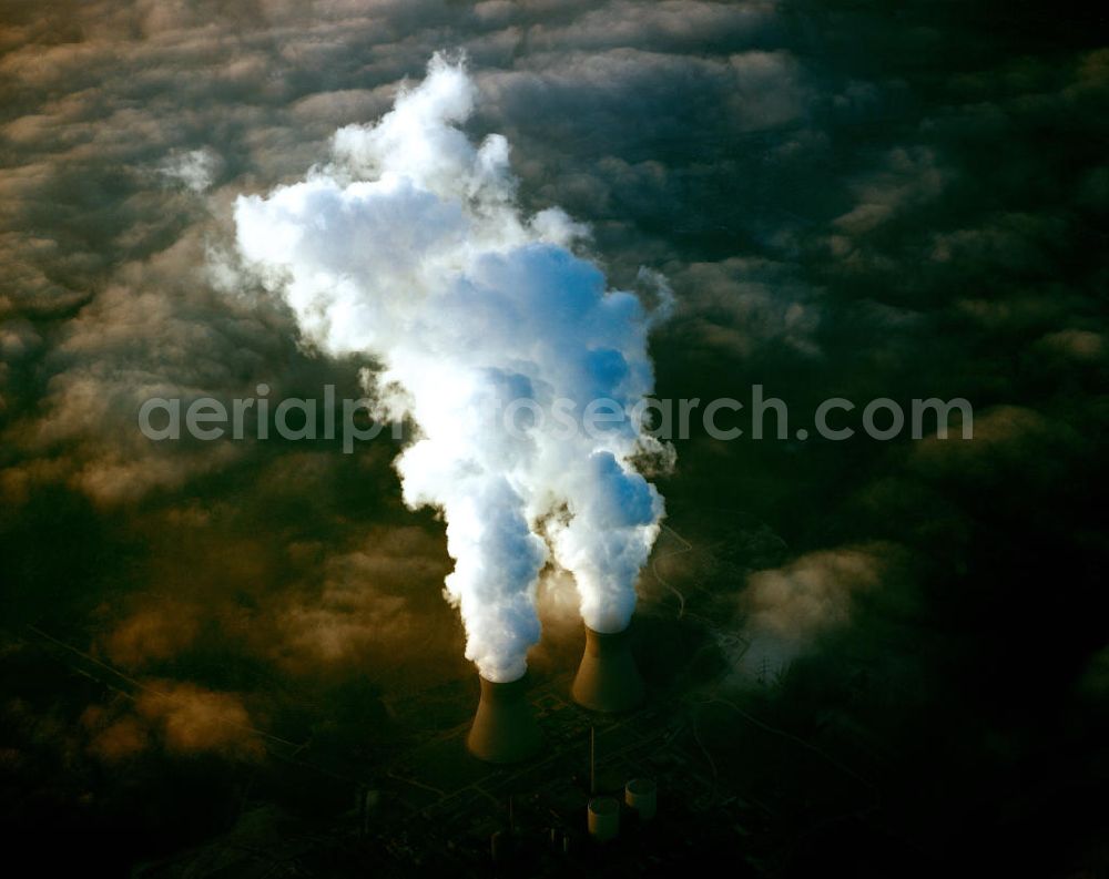 Aerial image Gundremmingen - Aufsteigende Rauchwolken von den Kühltürmen des Kernkraftwerk Gundremmingen. Das KGG ist mit einer Leistung von 2 × 1344 MW das leistungsstärkste deutsche Kernkraftwerk. Es steht in Gundremmingen im schwäbischen Landkreis Günzburg in Bayern. Betreiber ist die Kernkraftwerk Gundremmingen GmbH (KGG). View of the nuclear power plant Gundremmingen (abbreviation KGG) has a capacity of 2 × 1344 MW, the most powerful German nuclear power plant.