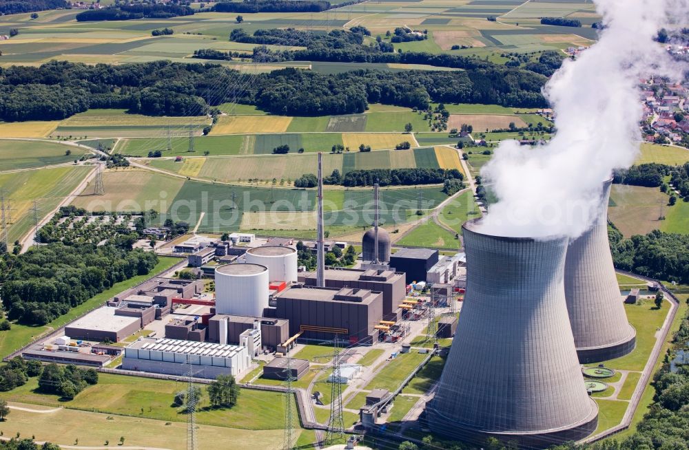 Gundremmingen from above - The Gundremmingen Nuclear Power Plant near Guenzburg in the state Bavaria. You can see the two cooling towers and the reactor blocks A, B and C. The power plant is operated by Kernkraftwerk Gundremmingen GmbH in the municipality Gundremmingen