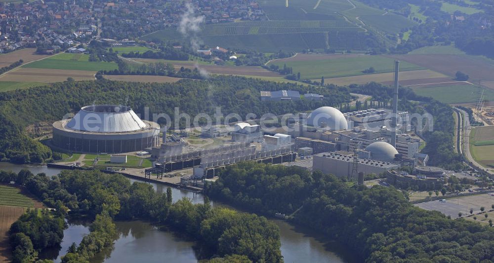 Aerial image Neckarwestheim - Das Kernkraftwerk Neckarwestheim auf dem Gebiet der Gemeinden Neckarwestheim und Gemmrigheim am rechten Ufer des Neckars zwischen Heilbronn und Ludwigsburg. Das Kraftwerk startete seinen kommerziellen Betrieb im Dezember 1976. Betreiber des Kraftwerks ist das EnBW-Tochterunternehmen EnBW Kernkraft GmbH. The nuclear power station Neckarwestheim on the right bank of the Neckar river between Heilbronn and Ludwigsburg. The power plant started its commercial operation in December 1976. Operator of the power plant is the subsidiary of EnBW the EnBW Kernkraft GmbH.