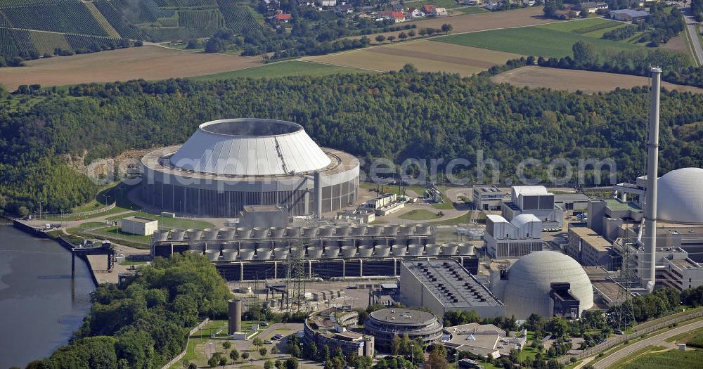 Neckarwestheim from the bird's eye view: Das Kernkraftwerk Neckarwestheim auf dem Gebiet der Gemeinden Neckarwestheim und Gemmrigheim am rechten Ufer des Neckars zwischen Heilbronn und Ludwigsburg. Das Kraftwerk startete seinen kommerziellen Betrieb im Dezember 1976. Betreiber des Kraftwerks ist das EnBW-Tochterunternehmen EnBW Kernkraft GmbH. The nuclear power station Neckarwestheim on the right bank of the Neckar river between Heilbronn and Ludwigsburg. The power plant started its commercial operation in December 1976. Operator of the power plant is the subsidiary of EnBW the EnBW Kernkraft GmbH.