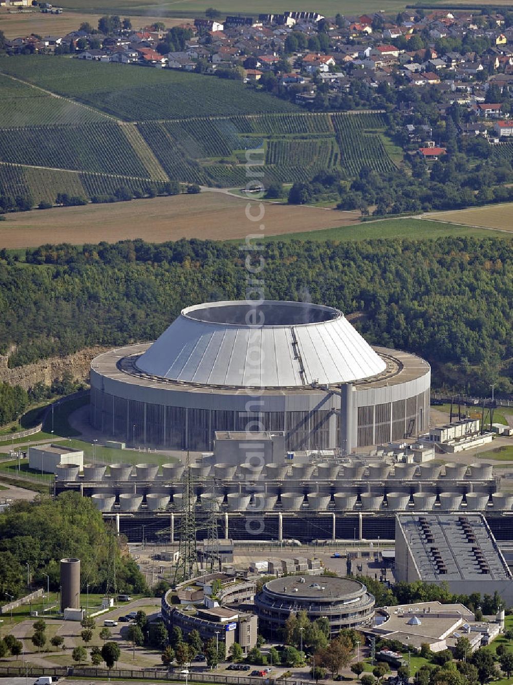 Neckarwestheim from above - Das Kernkraftwerk Neckarwestheim auf dem Gebiet der Gemeinden Neckarwestheim und Gemmrigheim am rechten Ufer des Neckars zwischen Heilbronn und Ludwigsburg. Das Kraftwerk startete seinen kommerziellen Betrieb im Dezember 1976. Betreiber des Kraftwerks ist das EnBW-Tochterunternehmen EnBW Kernkraft GmbH. The nuclear power station Neckarwestheim on the right bank of the Neckar river between Heilbronn and Ludwigsburg. The power plant started its commercial operation in December 1976. Operator of the power plant is the subsidiary of EnBW the EnBW Kernkraft GmbH.