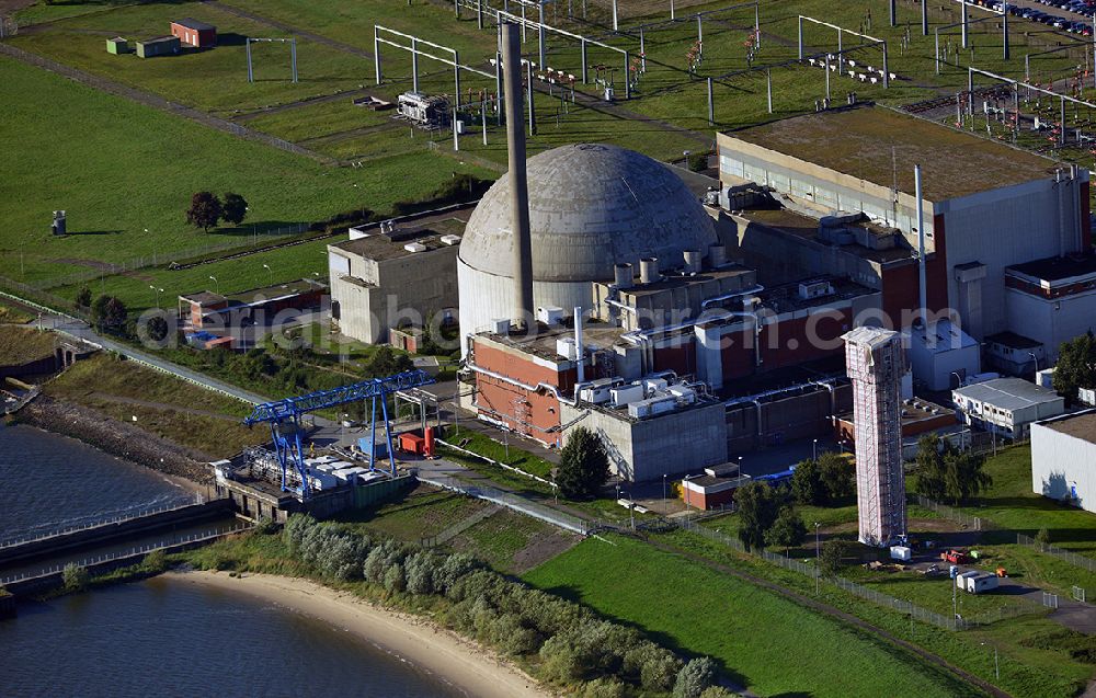 Stade from above - View the nuclear power plant Stade in the honomynous city in Lower Saxony. It is the first decommissioned nuclear power plant in Germany since the nuclear phaseout and is currently under demolition. It was equipped with a pressurized water reactor and owned by E.ON (66.7%) and Vattenfall (33.3%)