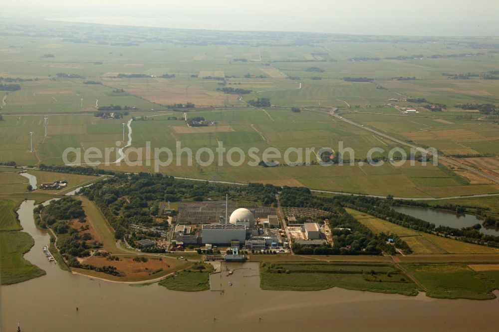 Stadland from the bird's eye view: Kernkraftwerk KKW / Atomkraftwerk AKW Unterweser KKU an der Weser in Niedersachsen. Nuclear power station NPS / atomic plant Unterweser at the Weser river in Lower Saxony.