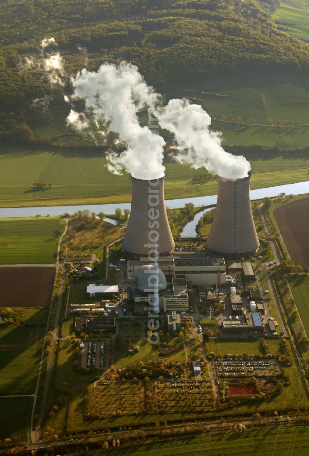 Grohnde from the bird's eye view: View onto the cooling tower of the Nuclear Power Plant in Grohnde in the state Lower Saxony. It is located north of Grohnde at the river Weser