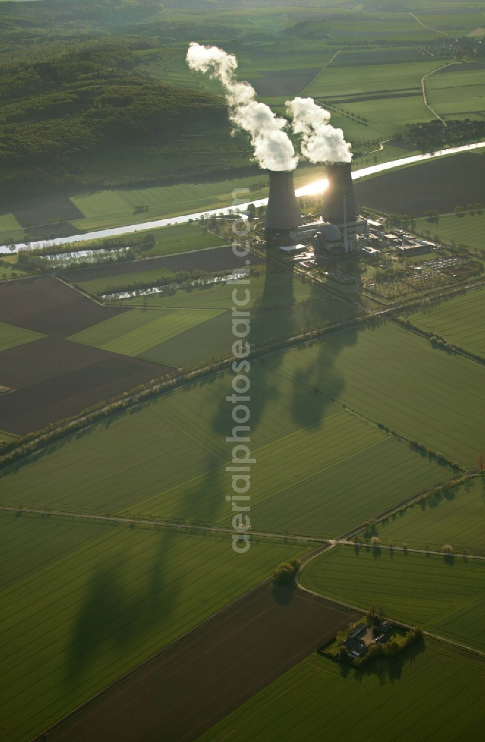 Grohnde from the bird's eye view: View onto the cooling tower of the Nuclear Power Plant in Grohnde in the state Lower Saxony. It is located north of Grohnde at the river Weser