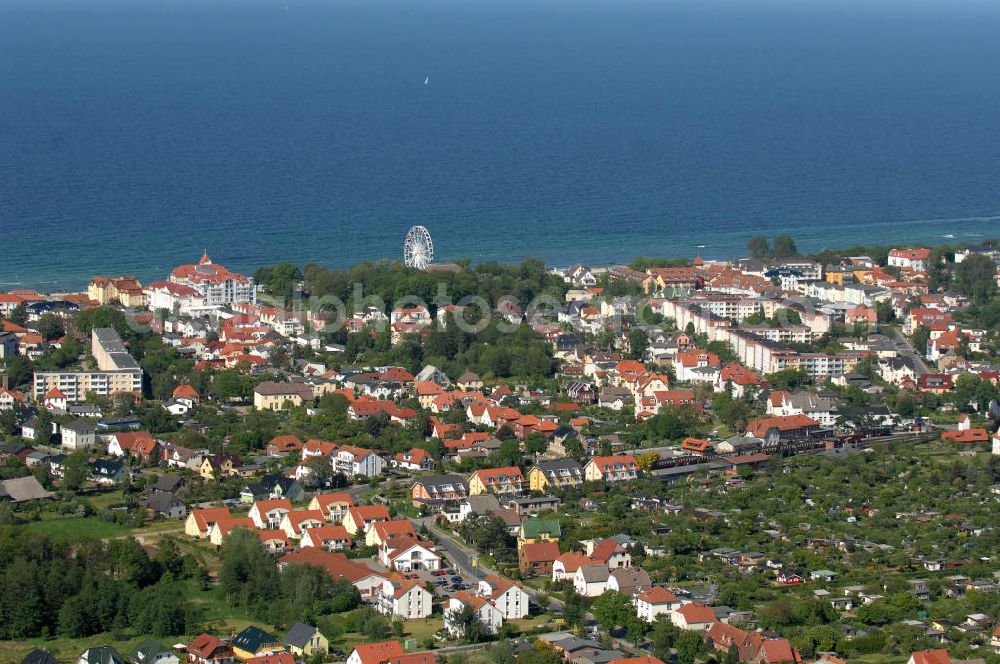 Aerial photograph Kühlungsborn - Blick auf das Stadtzentrum West von Kühlungsborn im Landkreis Bad Doberan in Mecklenburg-Vorpommern. Hinter Kleingartenanlagen befindet sich der Bahnhof Kühlungsborn West der Mecklenburgischen Bäderbahn Molli, die zwischen Bad Doberan, Heiligendamm und Ostseebad Kühlungsborn verkehrt. Kontakt: Mecklenburgische Bäderbahn Molli GmbH, Tel.: +49 (0)38203 - 4150,