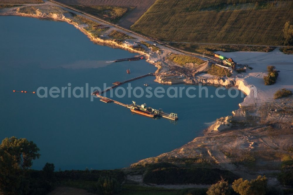 Neupotz from the bird's eye view: Site and tailings area of the gravel and rhine gold mining on old rhine in Neupotz in the state Rhineland-Palatinate