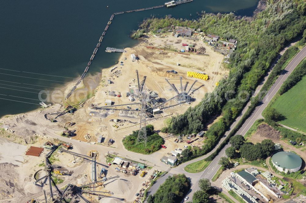 Aerial photograph Neukirchen-Vluyn - Terrain and waste areas of the gravel and sand opencast mine on Krefelder Strasse in Neukirchen-Vluyn in the state of North Rhine-Westphalia, Germany