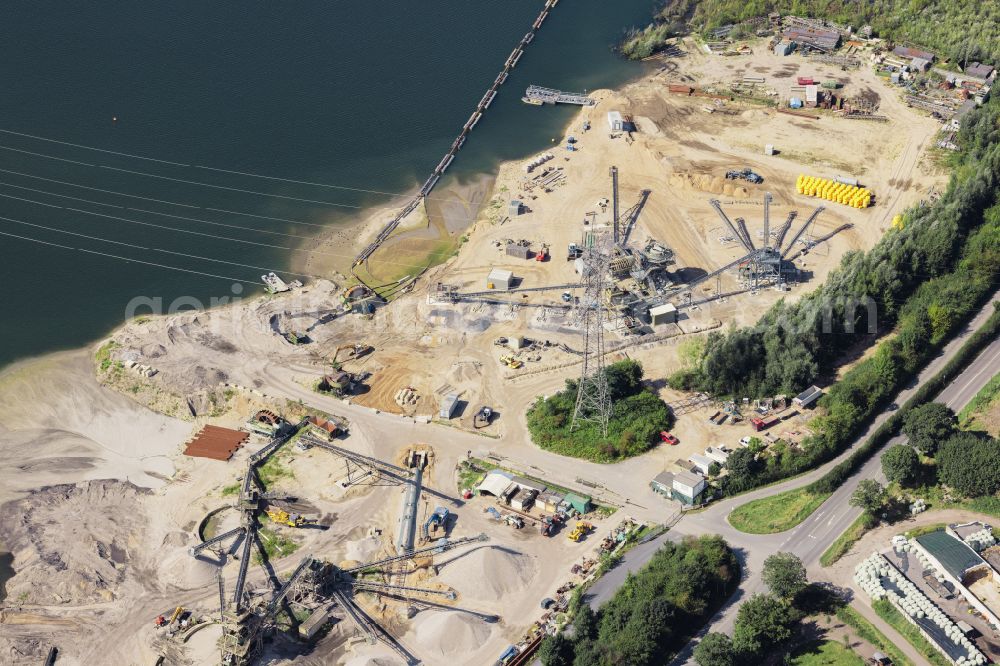 Neukirchen-Vluyn from above - Terrain and waste areas of the gravel and sand opencast mine on Krefelder Strasse in Neukirchen-Vluyn in the state of North Rhine-Westphalia, Germany