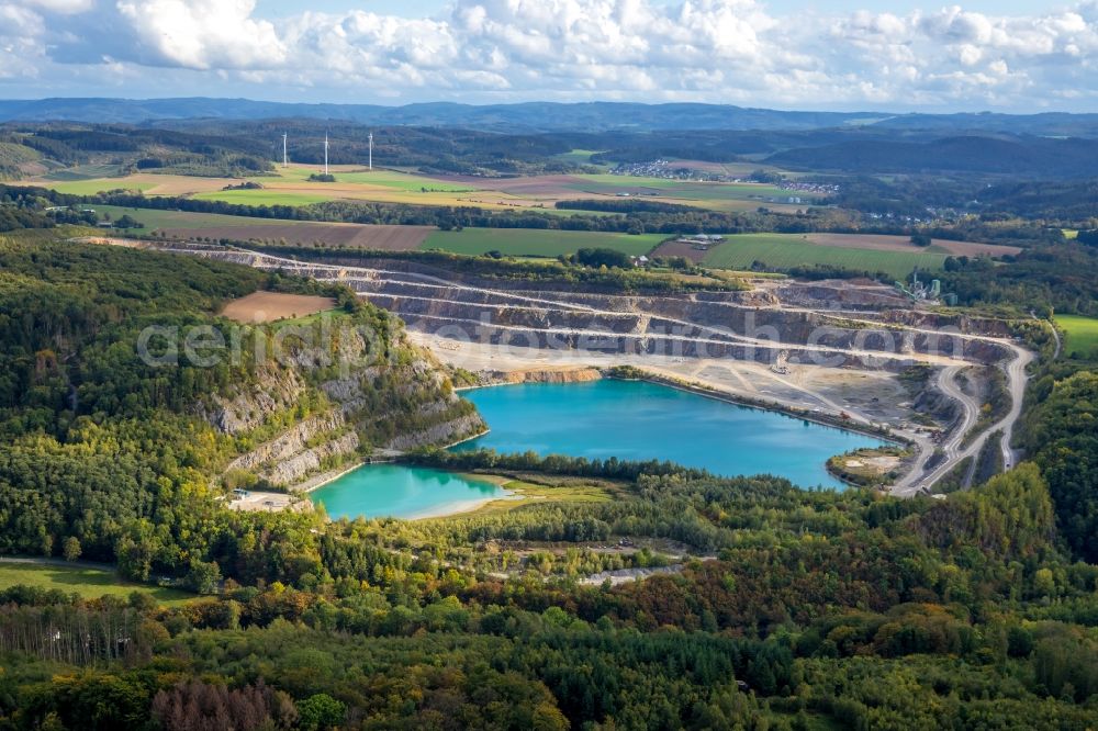 Aerial image Balve - Site and tailings area of the gravel mining ond flooded gravel pit in Balve in the state North Rhine-Westphalia, Germany