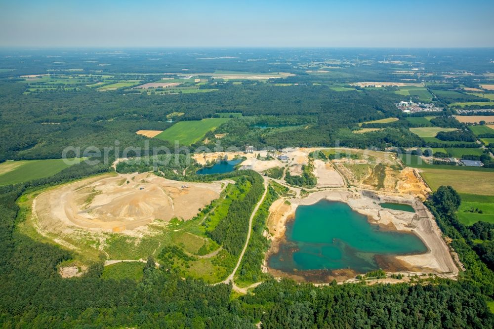 Bottrop from the bird's eye view: Site and tailings area of the gravel mining lake Kirchhellen in Bottrop in the state North Rhine-Westphalia