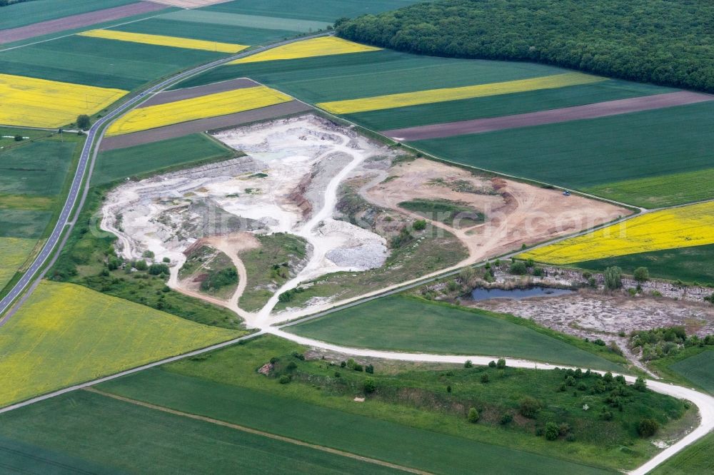 Aerial image Sulzheim - Site and tailings area of the gravel mining of Concrete-manufacturer in Sulzheim in the state Bavaria, Germany